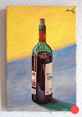 Bottle of wine over yellow background