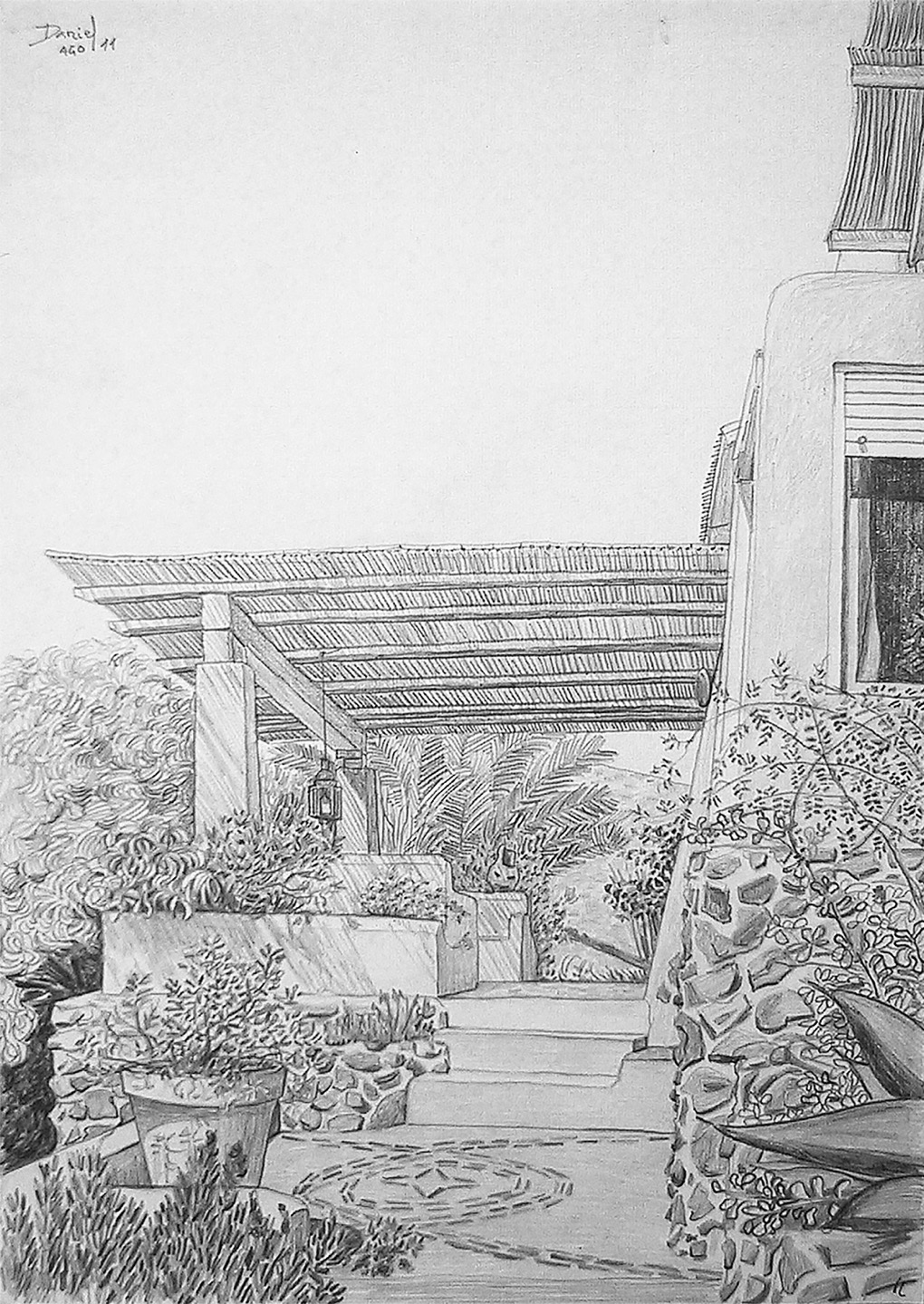 Terraza con cañizo y maceta